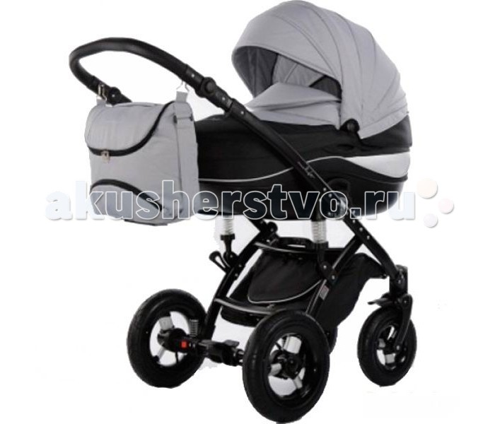 Коляска Tako Moonlight Black 2 в 1Moonlight Black 2 в 1 Коляска Tako Moonlight Black 2 в 1Moonlight Black 2 в 1Tako Monlight Black 2 в 1 (на черной раме) – это отличная легкая коляска, которая, кроме того, отличается своей многофункциональностью. Кроме люльки и прогулочного блока, Вы без труда сможете установить на специальные адаптеры автокресло для детишек от 1 до 14 кг. Люлька для новорожденного весит всего 4 кг и отделана двухслойной обшивкой. Специально отделанная экокожей ручка не позволит Вашим рукам замерзнуть в холодную погоду. Кроме того, Вы сможете выбрать подходящую высоту ручки для каждого человека, который катит коляску. Прогулочную часть Вы без труда сможете установить как по направлению движения, так и против него, что позволит Вам избежать попадания в лицо малыша ярких солнечных лучей или ветра. Спинка в этой части коляски регулируется по высоте – поэтому Вы сможете уложить его спать во время длительной поездки, а во время бодрствования ему будет комфортно изучать мир в положении «сидя». Капюшон довольно глубокий. Имеется также возможность его регулировки, поэтому ваш малыш будет под защитой в любую погоду. Универсальная детская коляска Tako Moonlight Black произведена с использованием высококачественных тканей, благодаря которым коляска и смотрится так стильно и заметно. Шасси: пружинные амортизаторы на раме и колесах, которые обеспечат минимальную «тряску» на дорогах легкая хромированная рама весит около 10 кг 2 вида амортизаторов, на каре и на колесах очень большая и закрытая корзина для покупок колеса резиновые надувные Люлька: ровное вентилируемое дно подголовник регулируется внутренняя ширина 34 см, длина 78 см вся обивка из хлопка есть ручка переноска, которую можно снять Прогулочный блок: блок реверсивный, его можно установить в двух направлениях легко устанавливается и снимается с рамы 4 наклона спинки сиденья, регулируется одной рукой рычагом на спинке бампер снимается можно снять с одной стороны или с двух сторон кнопочками пятиточечные ремни безопасности с паховым ремнем В комплект входит: шасси люлька прогулочный блок дождевик москитная сетка матрасик накидка на ножки сумка для родителей корзина для покупок Размеры люльки с капюшоном: 42х88х67 см. Размеры прогулочного блока с капюшоном: 42х85х64 см. Вес люльки: 4.95 кг. Вес прогулочного блока: 5.8 кг.<br>
